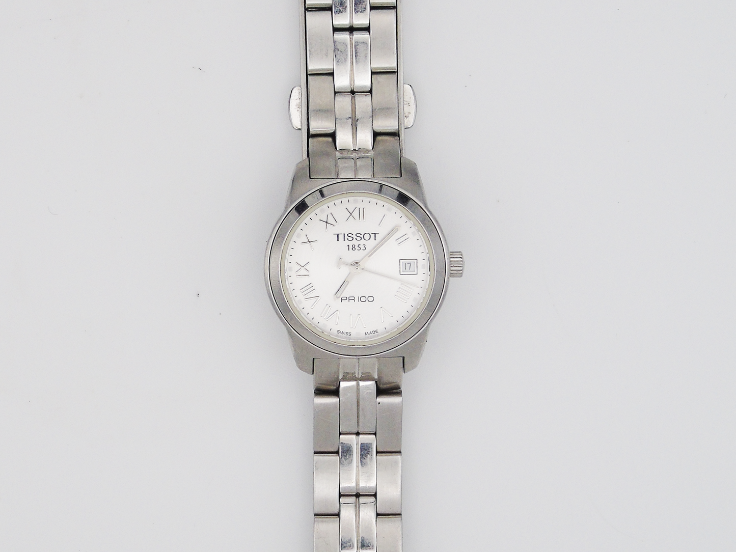 Tissot PR10 Ladies Watch Date FeatureSilver Tone Swiss Quartz Watch Small Wrist Elegant Steel - Gems Forgotten
