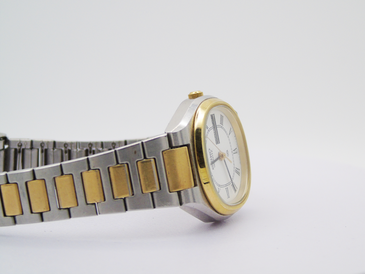 Seiko Ladies Watch Two tone Gold and Silver Tone Quartz Japanese Wristwatch Day Date Function - Gems Forgotten