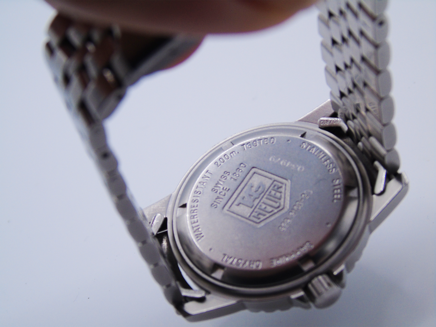 Tag Heuer Men’s Watch – Professional Quartz Wristwatch with Stainless Steel Bracelet, Black Dial - Gems Forgotten