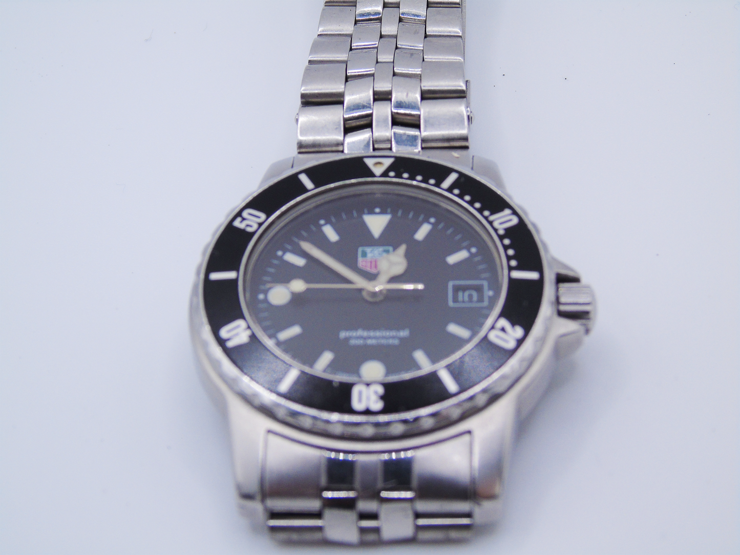 Tag Heuer Men’s Watch – Professional Quartz Wristwatch with Stainless Steel Bracelet, Black Dial - Gems Forgotten