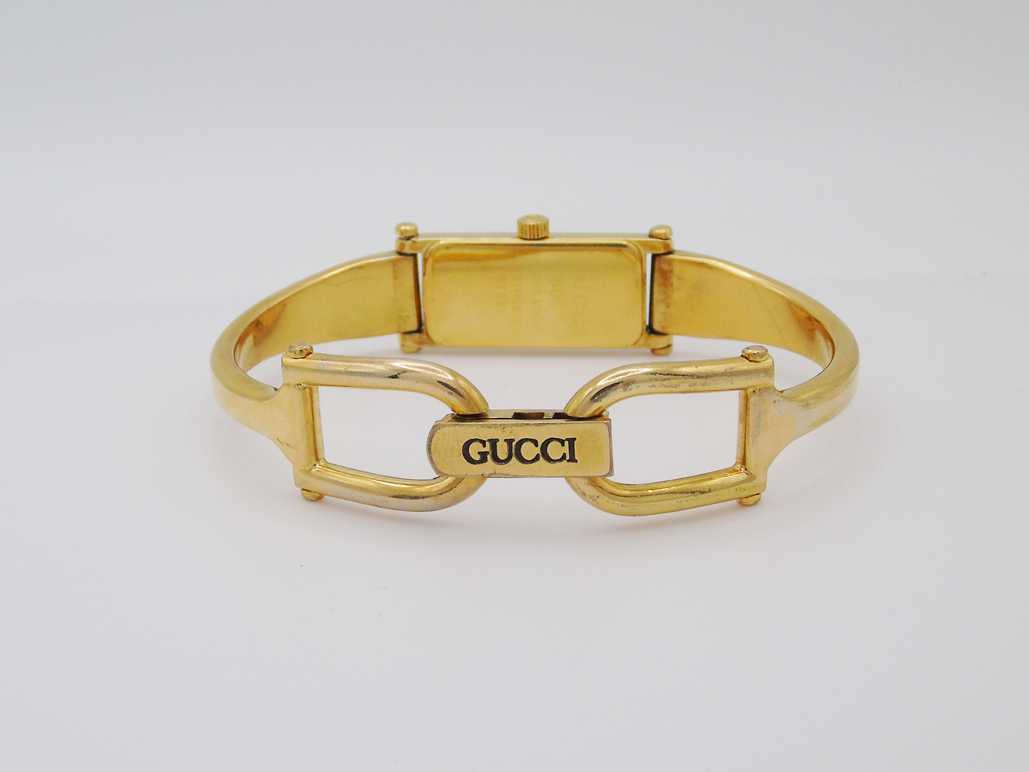 Gucci 1500L Gold Watch – Vintage Gucci Ladies Gold Watch, Elegant Gold Tank Watch Black Dial - Gems Forgotten