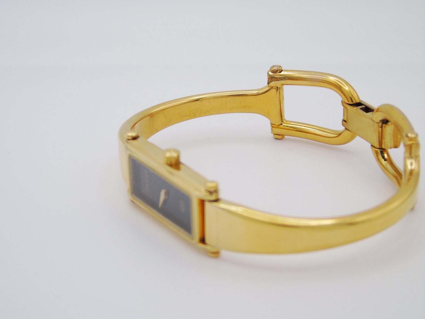 Gucci 1500L Gold Watch – Vintage Gucci Ladies Gold Watch, Elegant Gold Tank Watch Black Dial - Gems Forgotten