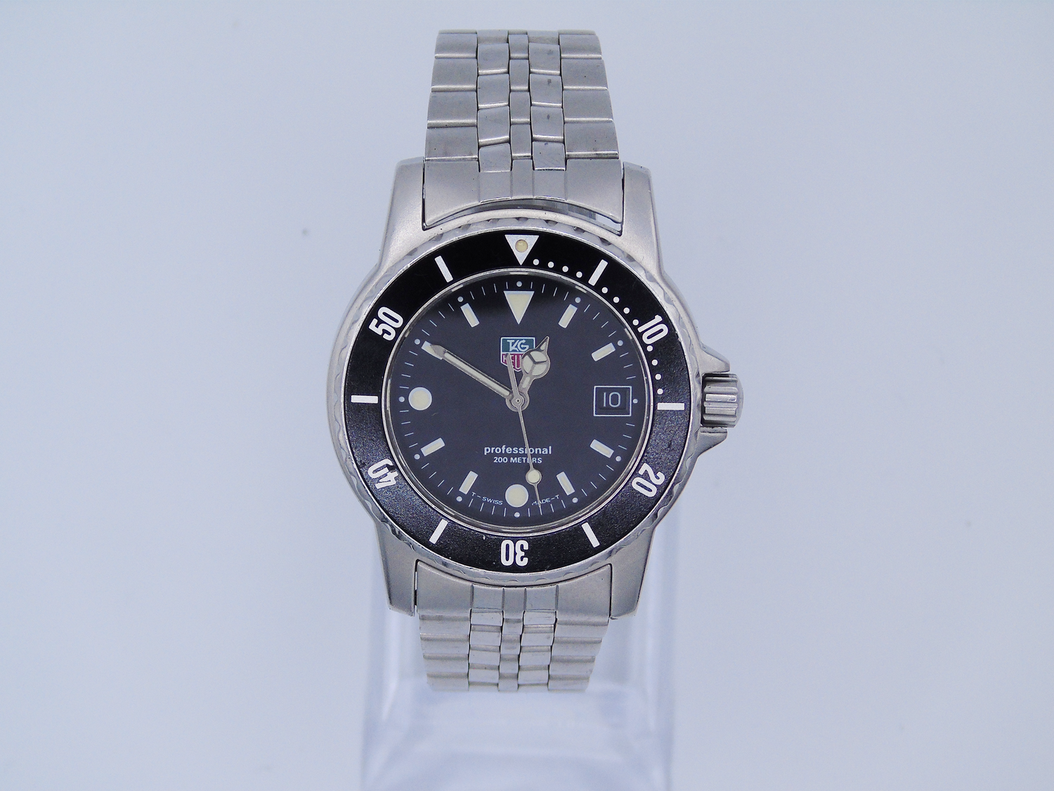 Tag Heuer Men’s Watch – Professional Quartz Wristwatch with Stainless Steel Bracelet, Black Dial - Gems Forgotten 