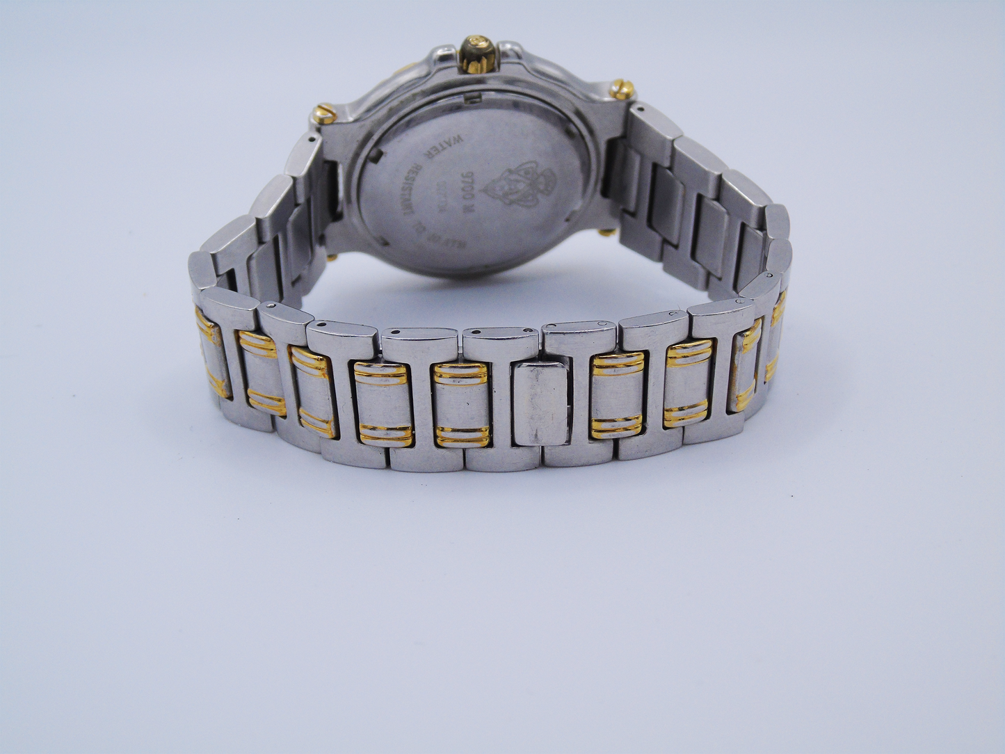 Vintage Gucci Mens Watch Green Bezel Lumi Hour Markers Date Function Gold and Silver Tone Two Tone Quartz 9700 M - Gems Forgotten 