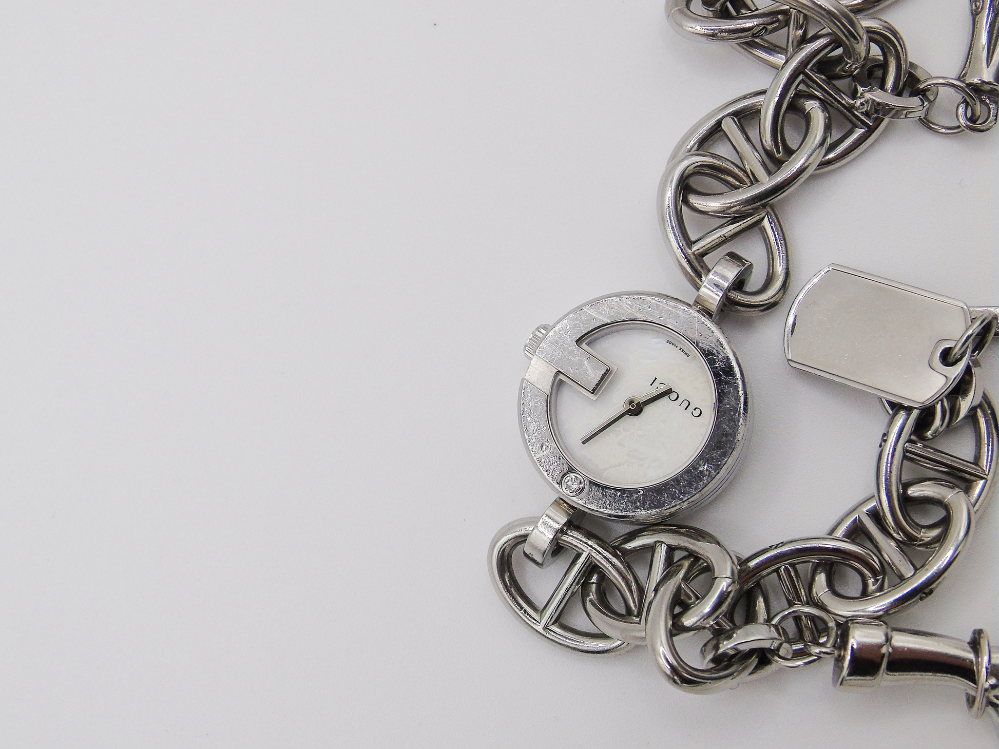 Vintage Gucci Watch Charm Bracelet Horsebit Cowboy Charms MOP Dial - Gems Forgotten 