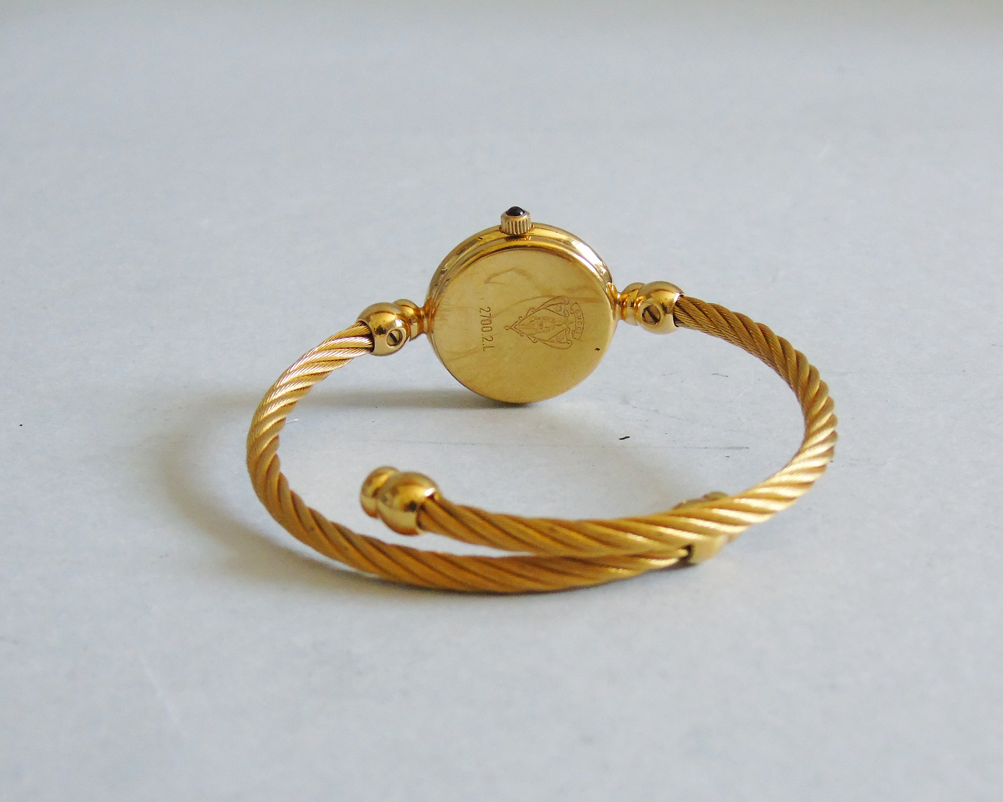 Gucci Ladies Gold Watch – 2700.2.L Model, 24k Gold-Plated with Black Dial - Gems Forgotten 