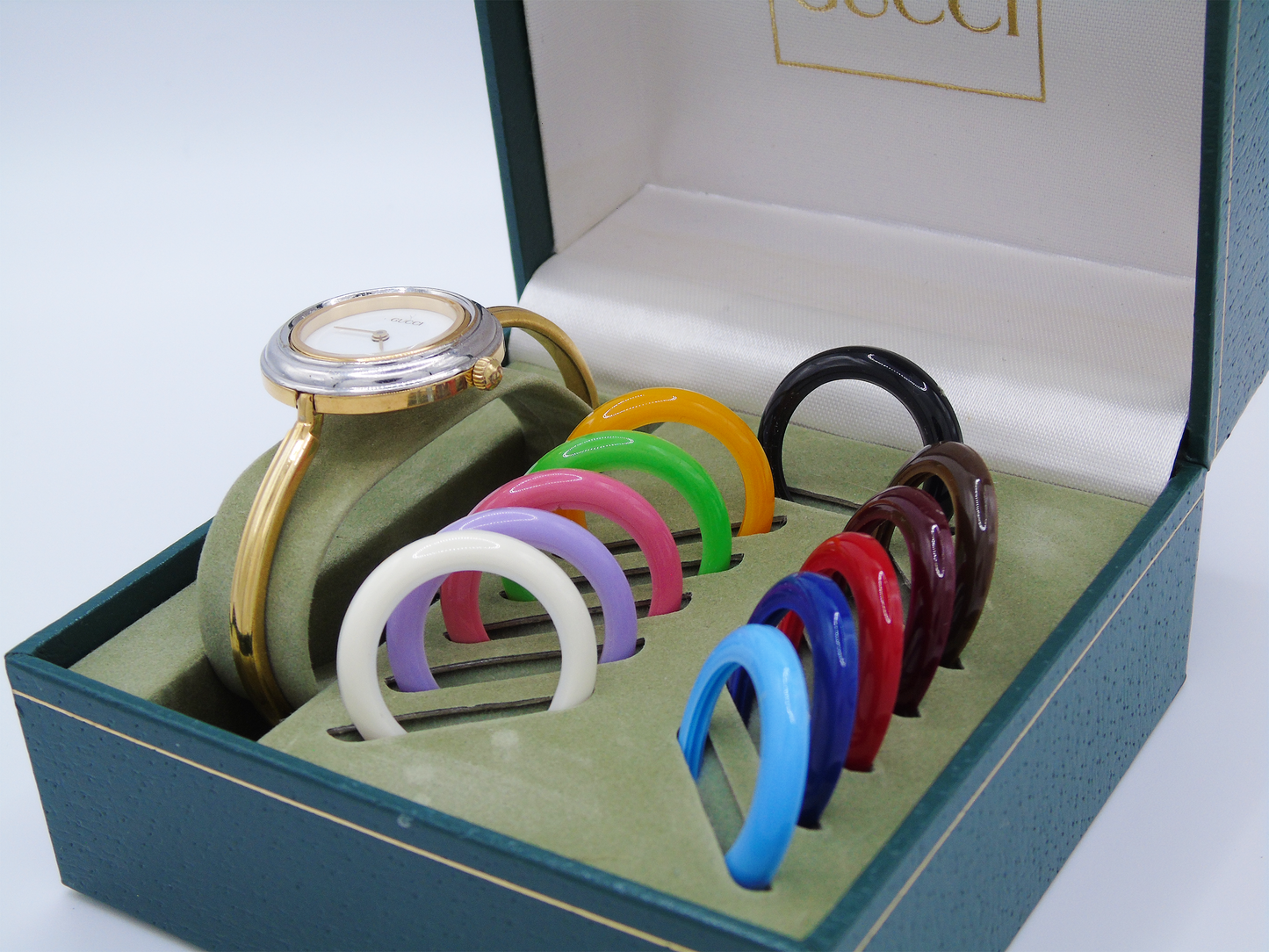 Vintage Gucci Change Bezel Watch – Gold-Plated with 12 Interchangeable Bezels & Box - Gems Forgotten 