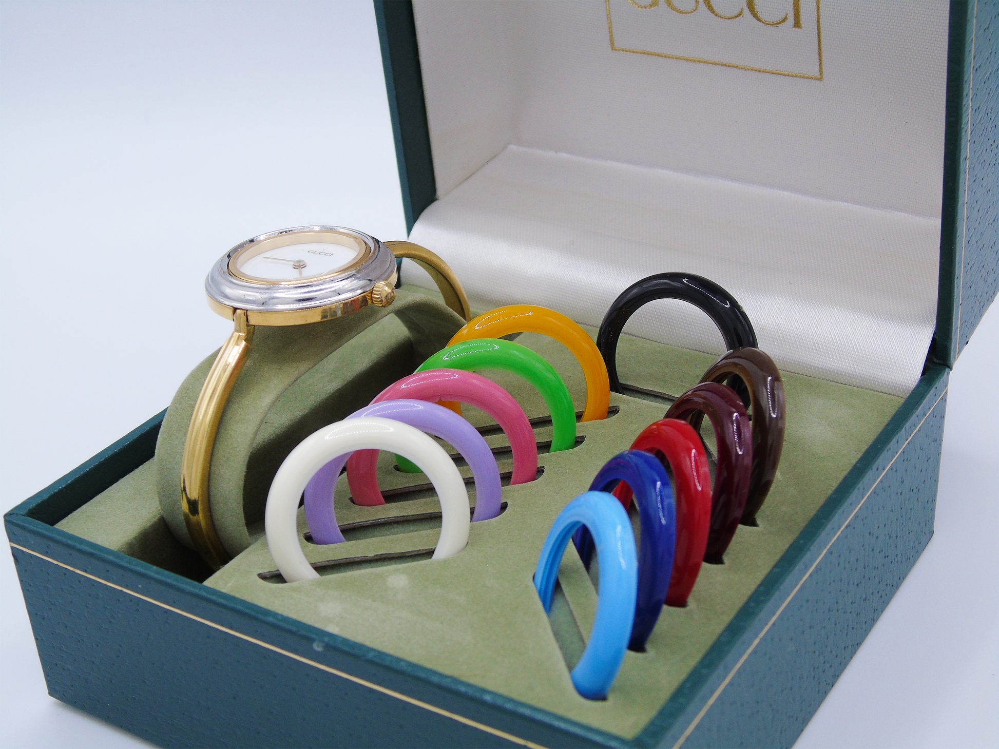 Vintage Gucci Change Bezel Watch – Gold-Plated with 12 Interchangeable Bezels & Box - Gems Forgotten 
