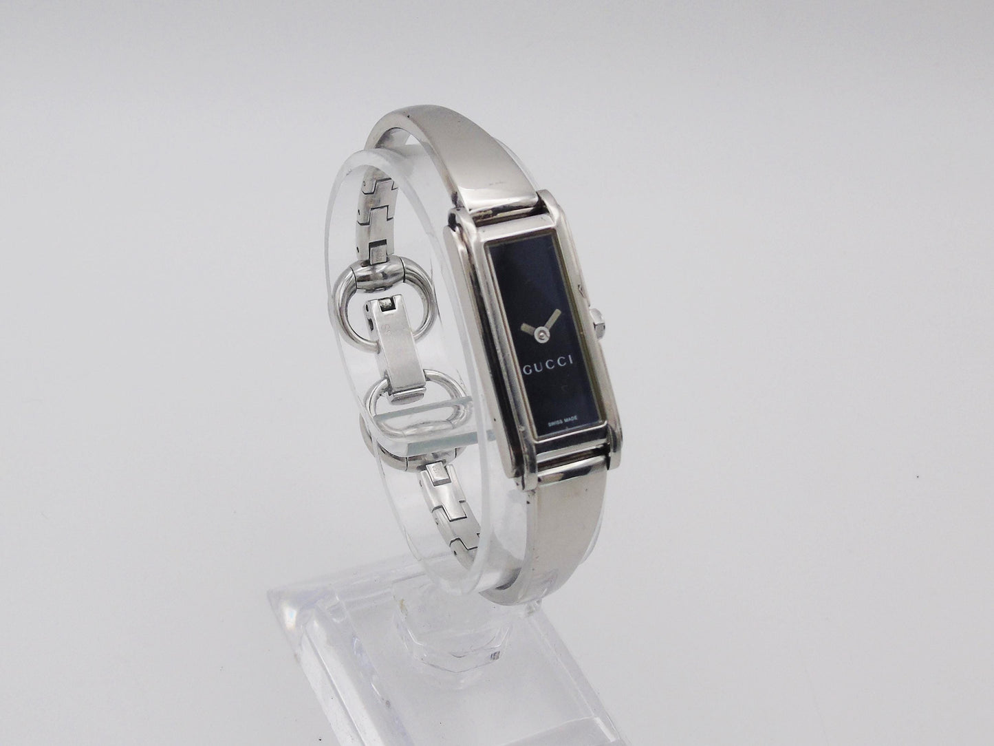 Vintage Gucci Watch: 1500L Black Dial, Stainless Steel Tank Style - Gems Forgotten 