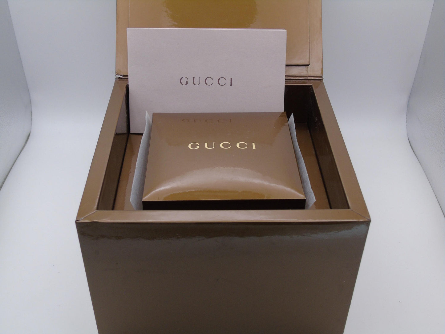 Vintage Gucci Watch: 1500L Black Dial, Stainless Steel Tank Style - Gems Forgotten 