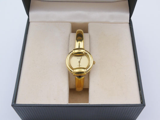 Vintage Gucci 1400L Gold Watch with Box and Papers Elegant Small Wristwatch Quartz - Gems Forgotten 