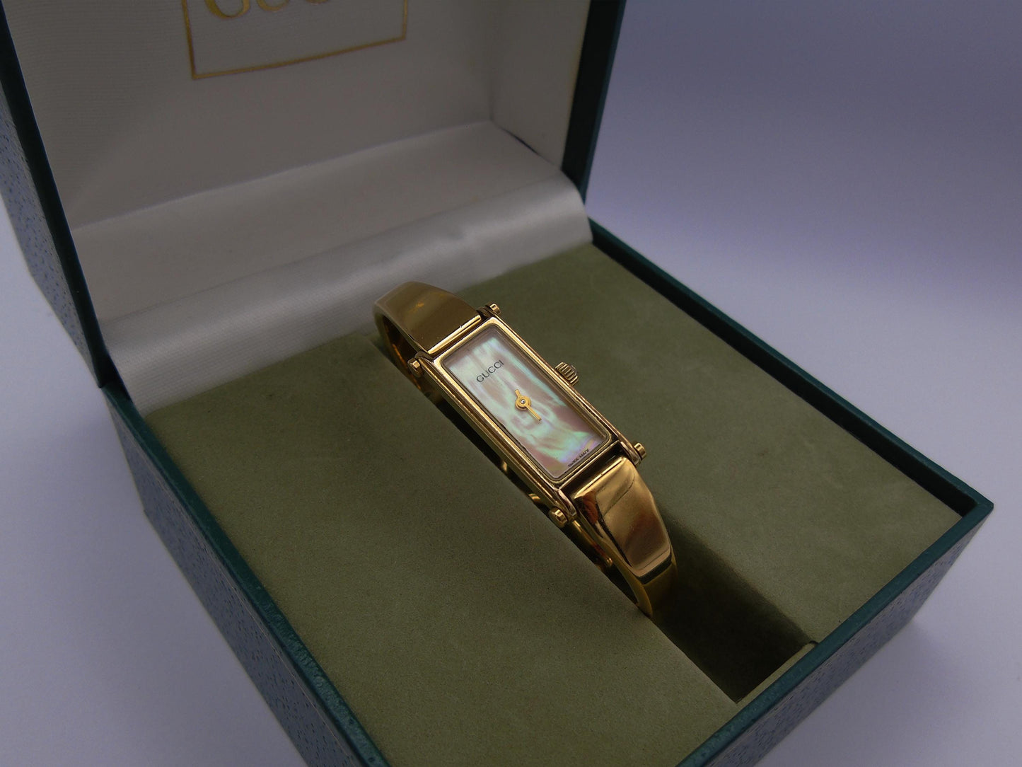 Gucci Ladies Gold Watch with Box– Gucci 1500L Model with Tank Watch Face & Mother of Pearl Dial G69