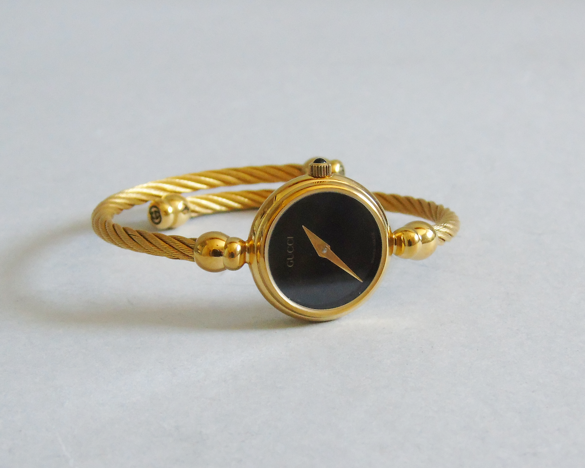 Gucci Ladies Gold Watch – 2700.2.L Model, 24k Gold-Plated with Black Dial - Gems Forgotten 